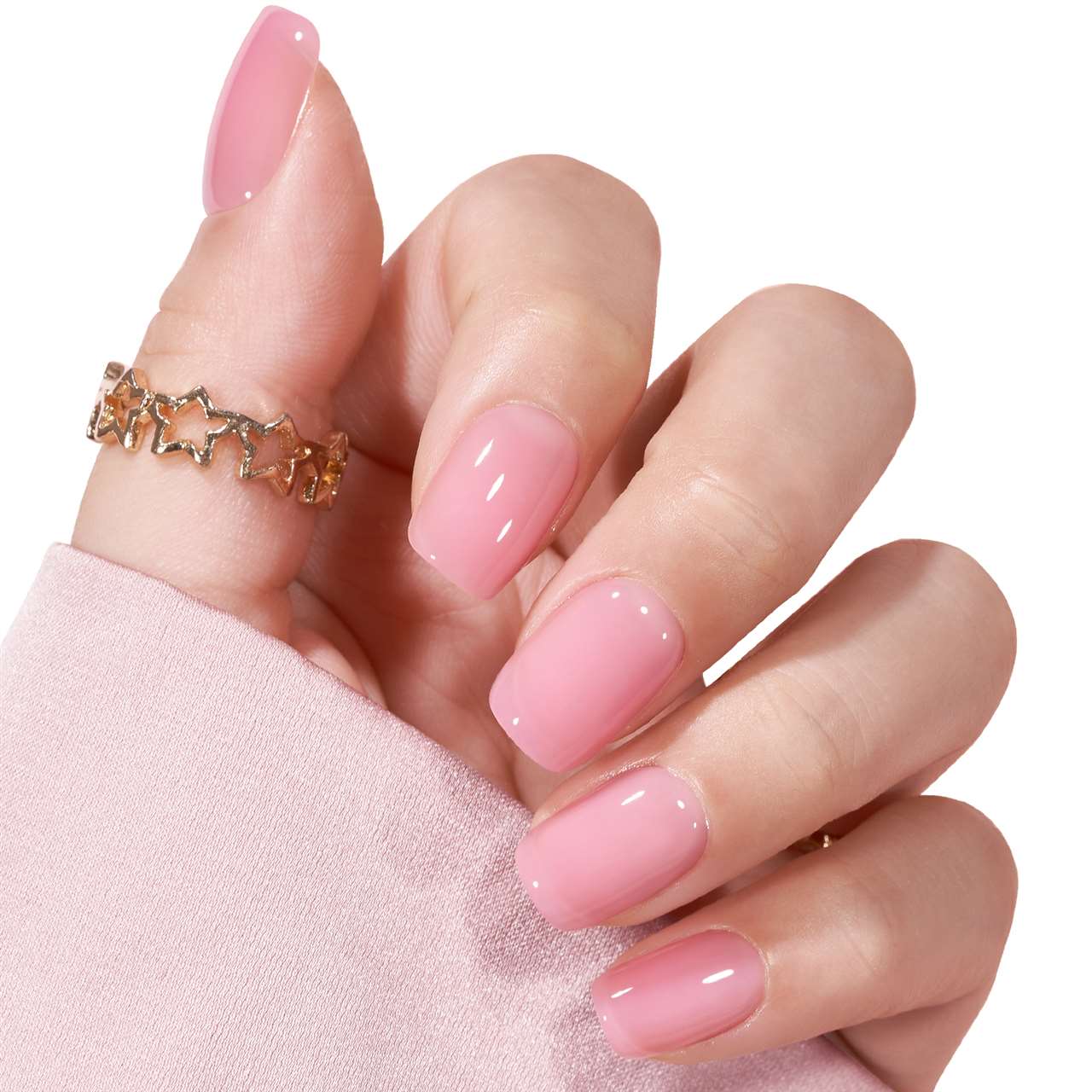 Short square press-on nagels in een effen roze kleur. De glanzende afwerking en speelse tint doen denken aan kauwgomballen, wat zorgt voor een frisse, vrouwelijke en tijdloze look.