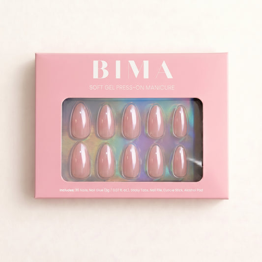 Lange almond plaknagels in lichtroze met glazed finish. De press-ons zie je in de verpakking, totaal 30 nagels.