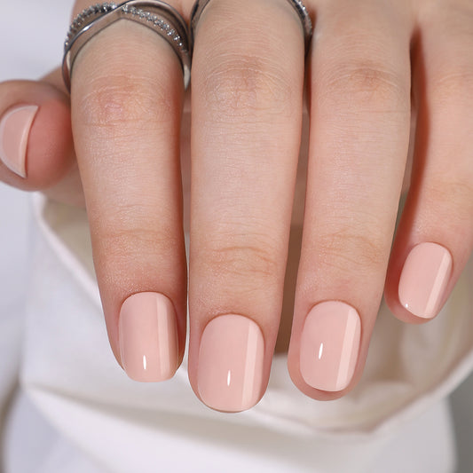 Extra korte press-on nagels in square/oval vom in een nude kleur