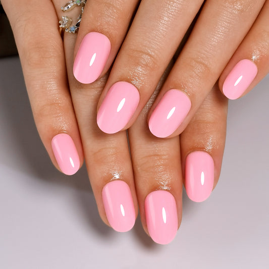 Ovale press on nagels in een mooie roze kleur met een beetje zoetigheid 